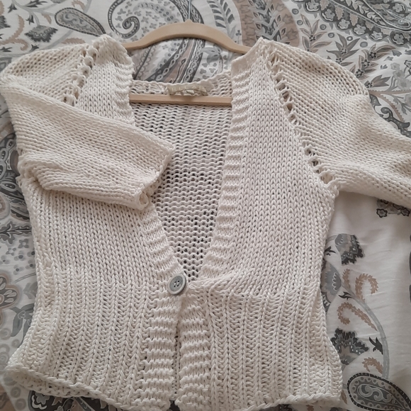 Short white knit sweater